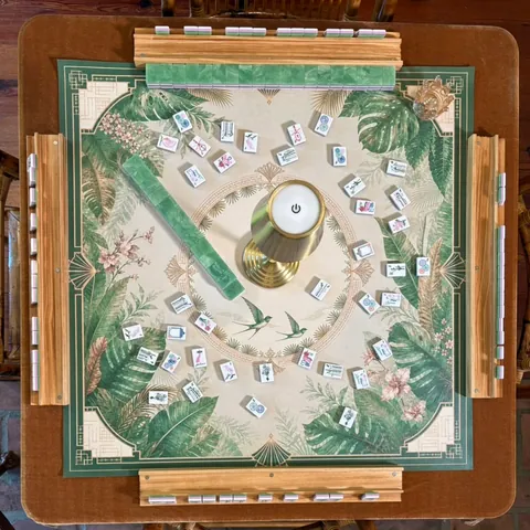 Garden Green Conservatory Mahjong mat photographed overhead with tiles