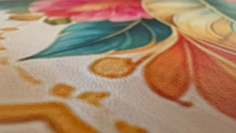 Close-up of the printed surface and botanical border on the Universal Tropics mat